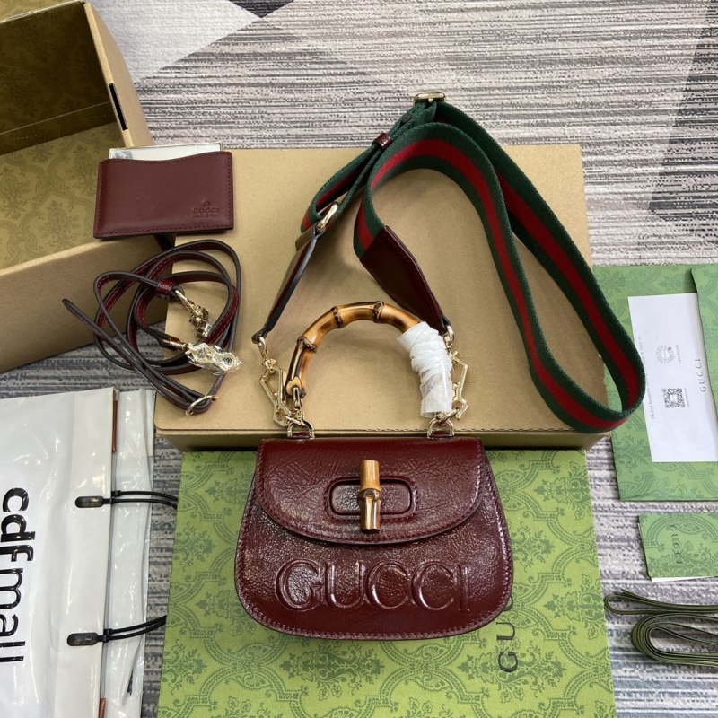 G*u*i top handle bags